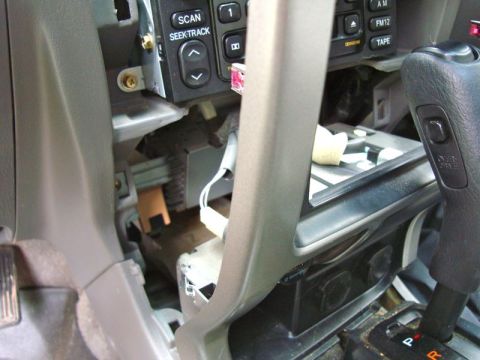 2002 Toyota 4Runner - Dashboard interior with stereo removed, revealing wiring and internal components.