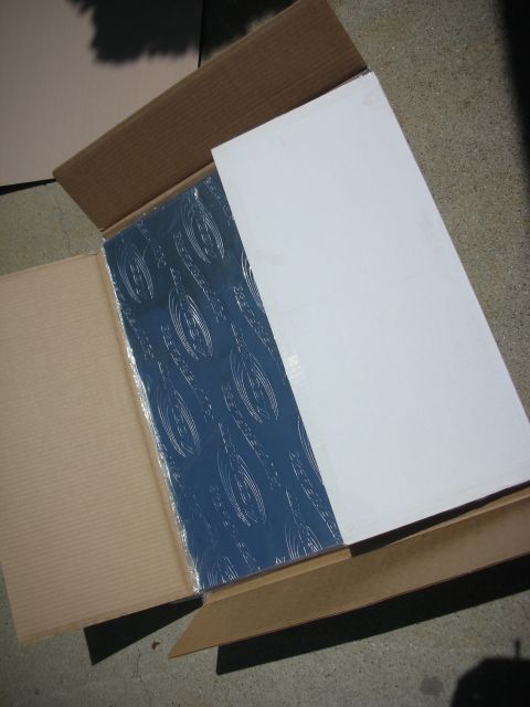 2004 Ford Crown Victoria - Sound deadening material, likely for automotive use, is shown inside a cardboard box.