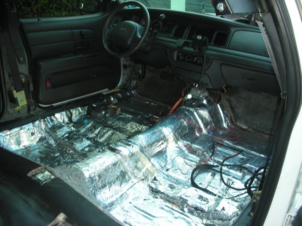 2004 Ford Crown Victoria interior with sound deadening material on the floor