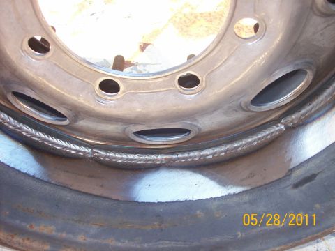1982 Ford F-100 - Wheel rim shows evidence of welding repair.