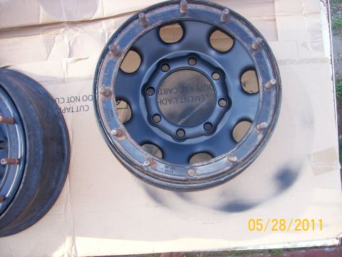 1982 Ford F-100 - A truck wheel and brake drum are shown on a cardboard surface, with a date stamp of 05/28/2011.