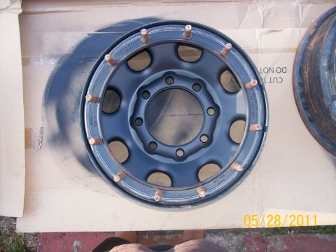 1982 Ford F-100 - A single truck wheel is shown, likely undergoing restoration or modification.