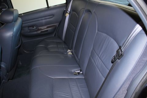 1999 Ford Crown Victoria - Interior view of the rear seats in a 1999 Ford Crown Victoria.