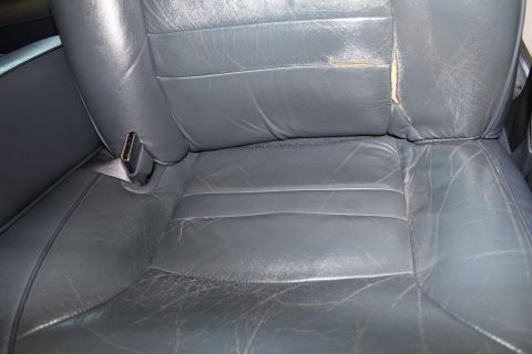 1999 Ford Crown Victoria - The drivers seat is broken down and torn after 12 years and 143,000 miles of use.