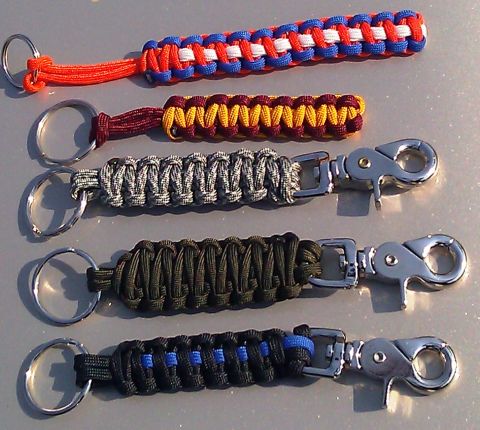 2006 Dodge Charger - A collection of five handmade paracord keychains, each with a unique color pattern and metal hardware.