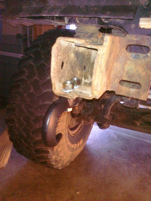 1995 Ford Bronco - This photo shows a tow hook and tire, not a 1995 Ford Bronco.