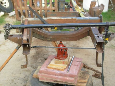 1976 Ford Bronco - SOLD Apr22 To straighten the core support brackets, I'm using my rock bar (an Expedition torsion bar) to pry them up. I'm using the ratchet…
