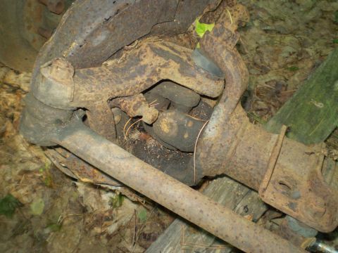 1979 Ford Bronco - Rusted axle parts, possibly from a 1979 Ford Bronco, are shown in detail.