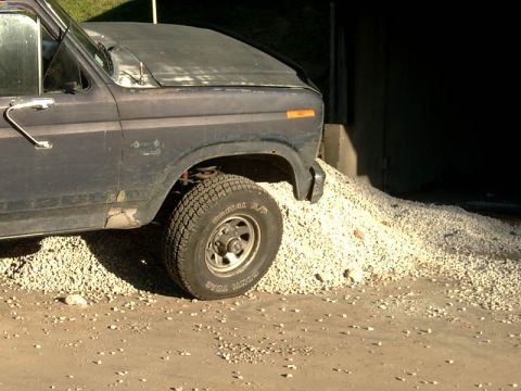 1982 Ford Bronco - This Ford truck appears to be from the early 1980s, with visible rust on the lower body panels.