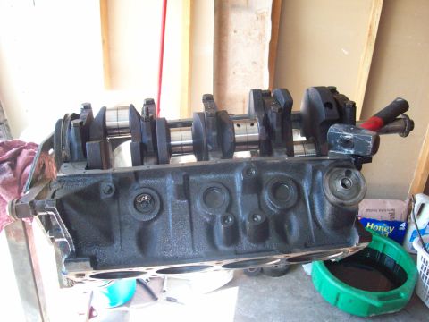 1985 Ford Bronco - Engine block and crankshaft assembly, possibly during a rebuild or repair process.