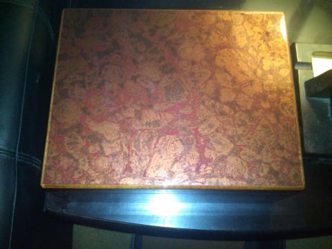 1993 Ford Bronco - A box with a marbled copper-like lid is visible on a dark surface.