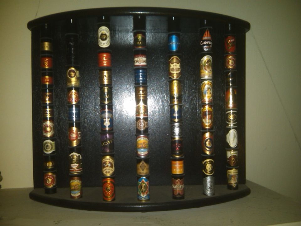 Humidor display case filled with cigar tins