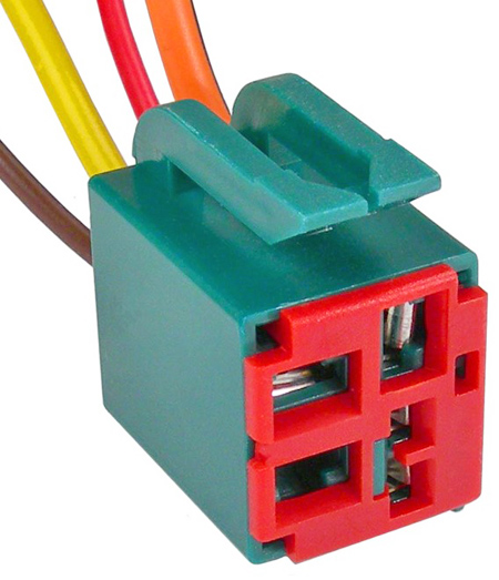 1990 Ford Bronco - This is a close-up view of a multi-pin electrical connector with several colored wires attached.