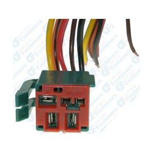 1990 Ford Bronco - Close-up view of a multi-pin electrical relay connector with several colored wires attached.