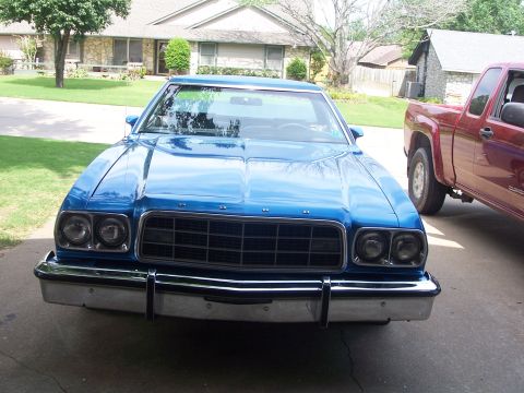 1973 Ford Ranchero - The front grille and headlight design clearly indicate this is a 1977 Ford LTD II, not a Ranchero.