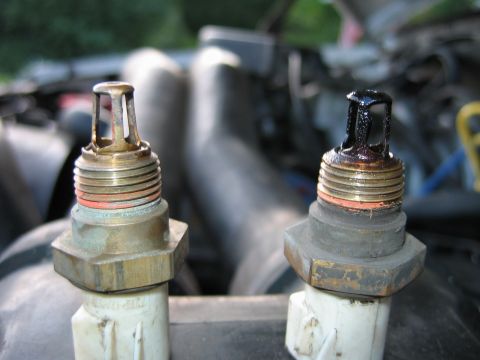 1992 Ford Bronco - Pic of the IAT I cleaned off versus the one that was pulled from the lower intake.
