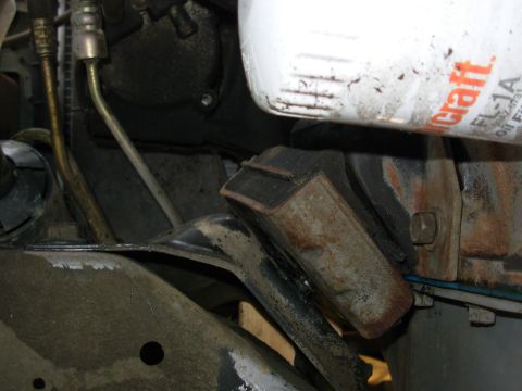 1995 Ford F-150 - The torn L engine mount is another part of the vibration during acceleration... I have the engine lifted & the nut removed from the bottom…