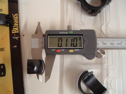 1995 Mercury Grand Marquis - A digital caliper is used to measure the diameter of a small black component, showing a reading of 0.110 inches.