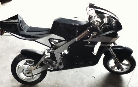 2006 Ford E350 - This sport motorcycle features a black and silver color scheme with a , aerodynamic design.