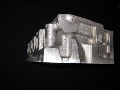 1972 Ford Ranchero - This is a close-up view of a cast aluminum intake manifold, likely for an engine.