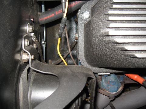 1968 Shelby GT500 - Detail shot of engine components, including a black valve cover and various hoses and wiring.