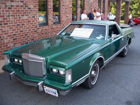 1971 Ford Ranchero - This 1977 Lincoln Mark V coupe utility vehicle is displayed at an outdoor event.