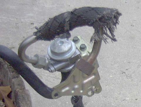 1997 Ford Taurus - Fuel pump assembly with damaged insulation, likely from a vehicle part sale.