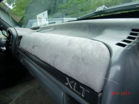 1993 Ford Bronco - The interior dashboard of a 1993 Ford Bronco XLT shows the "XLT" trim designation.