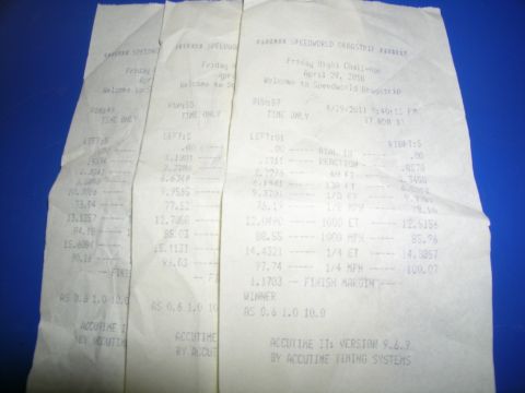 1995 Ford Probe - Multiple dragstrip time slips are shown, detailing race results and vehicle performance metrics.