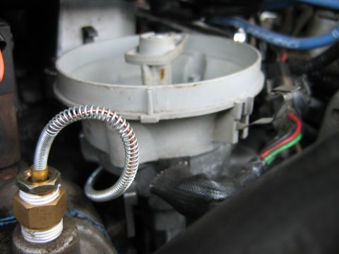 1992 Ford Bronco - This photo shows a close-up view of a vehicle's distributor cap and associated wiring.