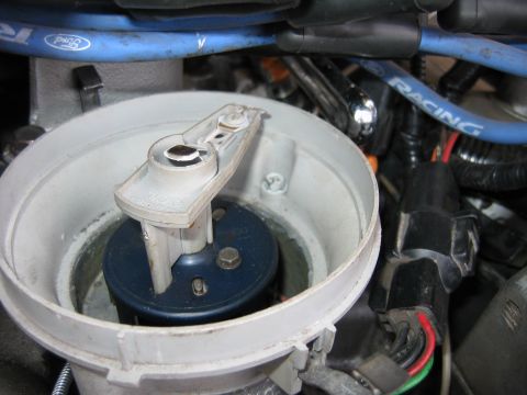 1992 Ford Bronco - Close-up of a vehicle's distributor cap and rotor assembly with associated wiring.