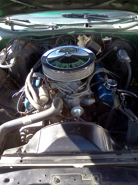 1973 Ford Ranchero - Engine bay view with a V8 engine and a chrome air cleaner assembly.