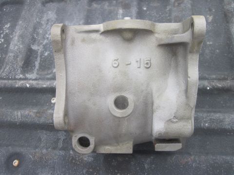 1979 Ford Bronco - Metal casting with stamped numbers '6-15' is shown against a dark background.