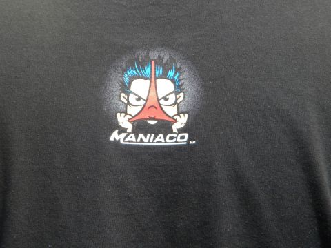 1986 Ford Bronco - A close-up of a t-shirt a cartoon character with blue hair and glasses.