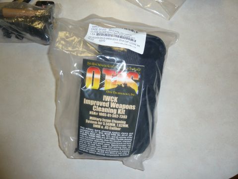 1992 Ford Mustang - This military issue cleaning kit contains tools for various firearms and comes in a black pouch.
