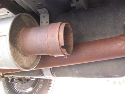 2008 Ford F-250 - The exhaust system components on this truck show significant rust and wear.