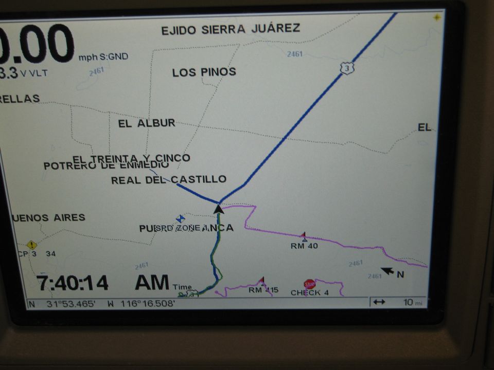 GPS screen showing map with route, time, and coordinates