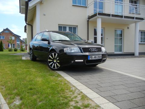 2003 Audi A6 - Black 2003 Audi A6 wagon parked in a driveway, showing its front 3/4 view and custom wheels.