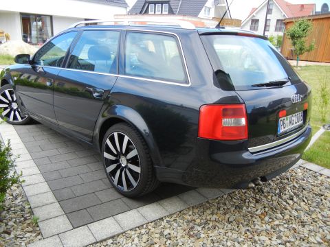 2003 Audi A6 - 2003 Audi A6 wagon seen from the rear 3/4 angle. The license plate is PB WG 2006.