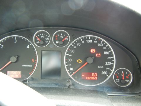 2003 Audi A6 - Dashboard gauges display mileage, speed, fuel, and temperature. Digital clock shows 15:00 on 06.20.2011.