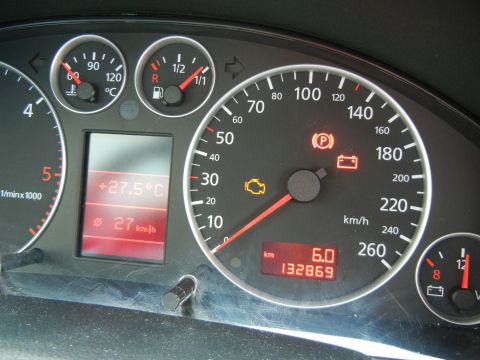 2003 Audi A6 - The car's dashboard displays various gauges and indicators, including the odometer reading 132,869 kilometers.
