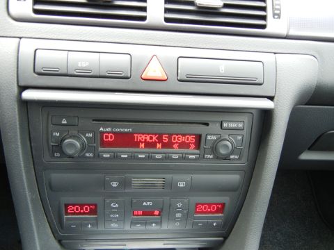 2003 Audi A6 - The interior dashboard features an Audi concert stereo system and dual-zone climate control, displaying a temperature of 20.0 degrees Celsi…