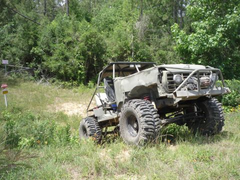 1990 Ford Bronco - This heavily modified off-road vehicle does not resemble a 1990 Ford Bronco.
