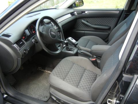 2003 Audi A6 - Interior of a 2003 Audi A6, the driver's side controls and front passenger seat.