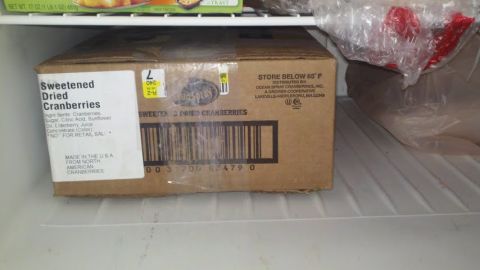1991 Ford Bronco - A box of sweetened dried cranberries is stored in a refrigerator, with other items visible in the background.