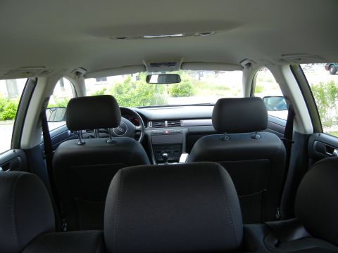 2003 Audi A6 - Interior view of a 2003 Audi A6, looking forward from the rear seats.