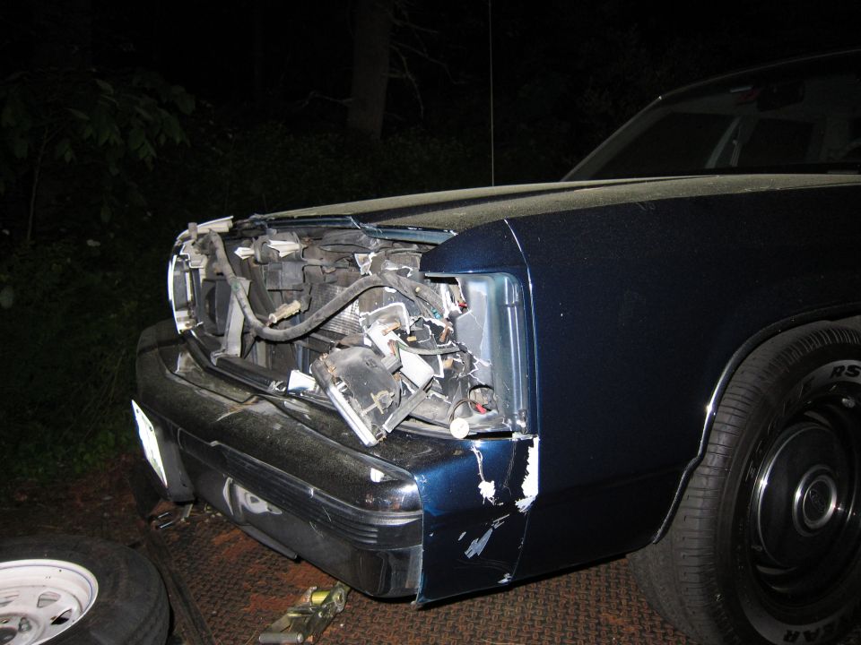 1991 Ford Crown Victoria LTD front end with damaged headlight and bumper