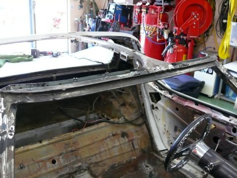 1976 Chevrolet Corvette - The interior of a 1976 Chevrolet Corvette is visible, stripped down for restoration work.