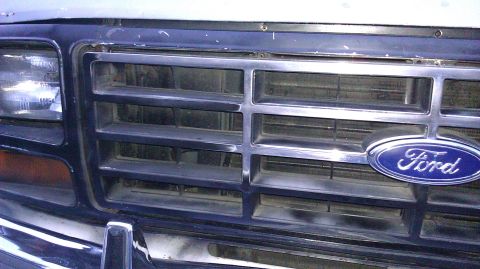 1984 Ford Bronco - Front grille detail of a Ford Bronco, likely from the early 1980s.