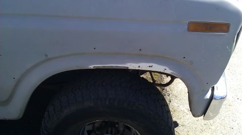 1984 Ford Bronco - Rust is visible on the fender of this vehicle, particularly around the wheel arch.
